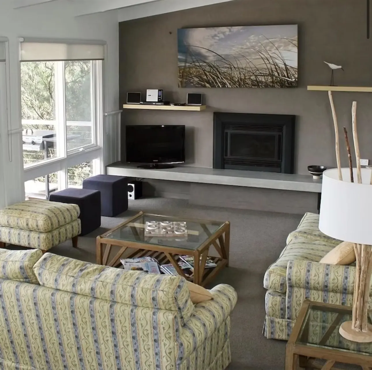 Lounge seating facing the gas log fire and TV in the open plan living room
