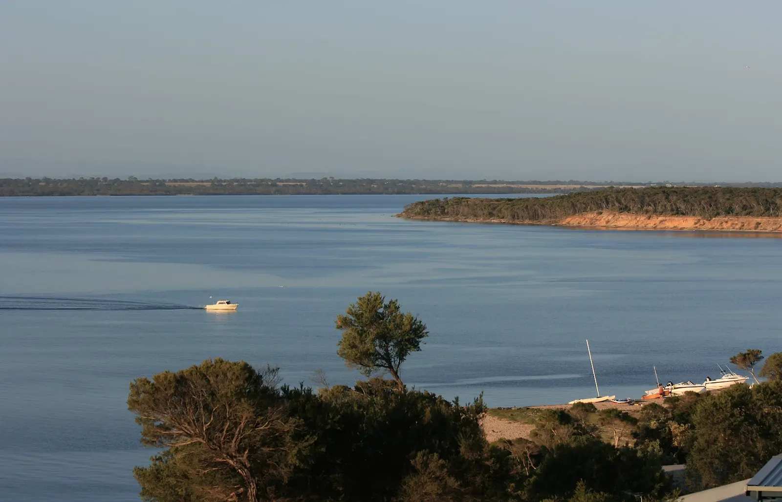 Lake Victoria and boats seen from the north-facing deck at The Waterfront Loch Sport